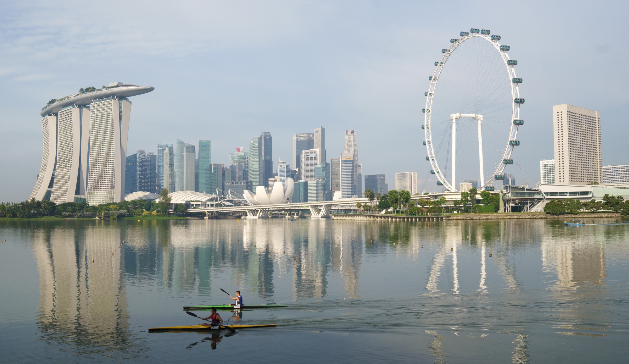 Kayakers row past the central business district&nbsp;at Marina Bay in Singapore&nbsp;in October.&nbsp;