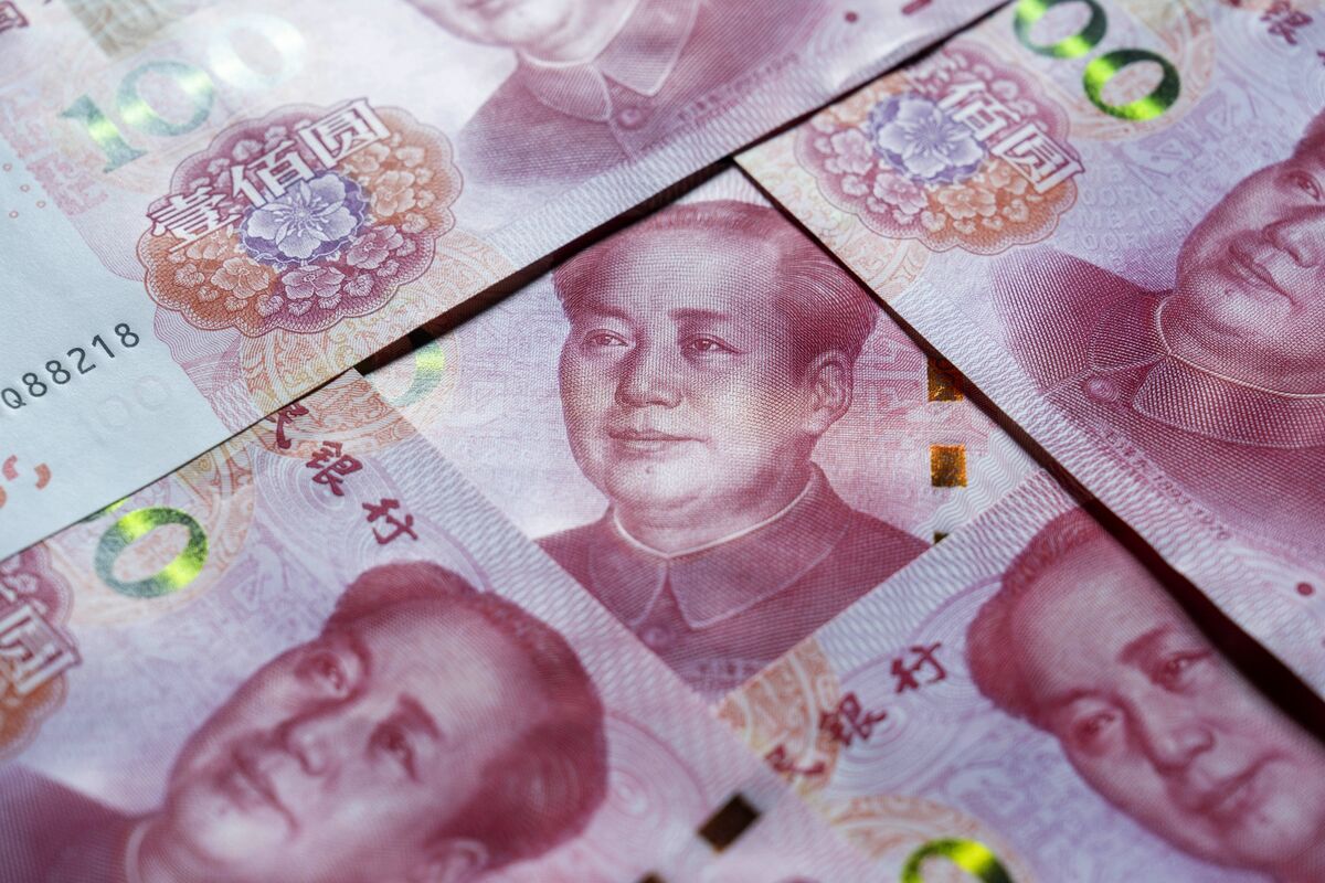 Yuan Climbs Past 7 Per Dollar Onshore for First Time Since 2023