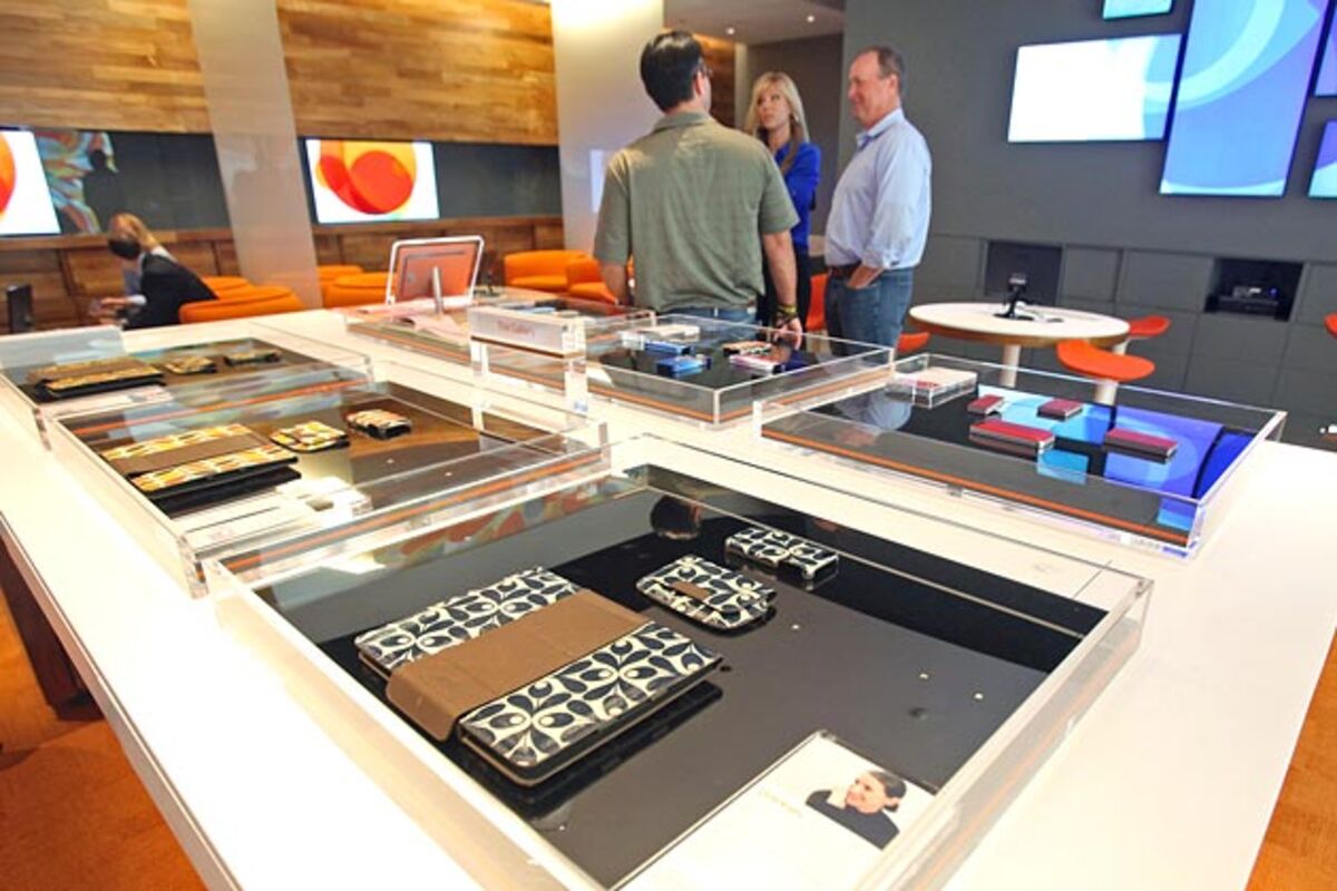AT&T's Retail Revamp Goes for a Genius Bar Look Bloomberg