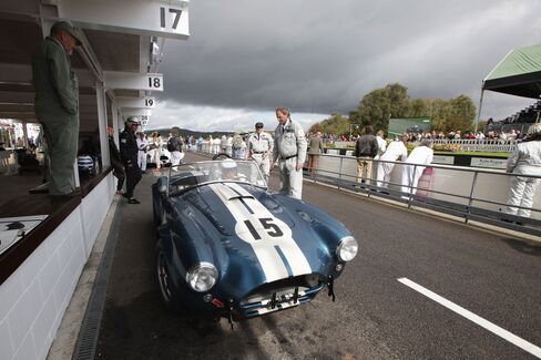 Joerg Bratke von Bergen No. 15 and the Shelby Cobra MKII of Team Meilenwerk Historic Racing in action at the Goodwood Revival 2012 in Chichester, U.K.