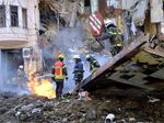 Firemen work to clear the rubble in Kharkiv on March 14.&nbsp;