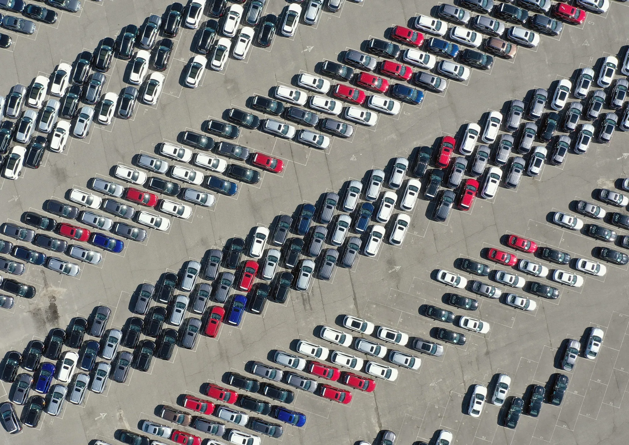 Cars populate a parking lot&nbsp;in Hicksville, New York.&nbsp;
