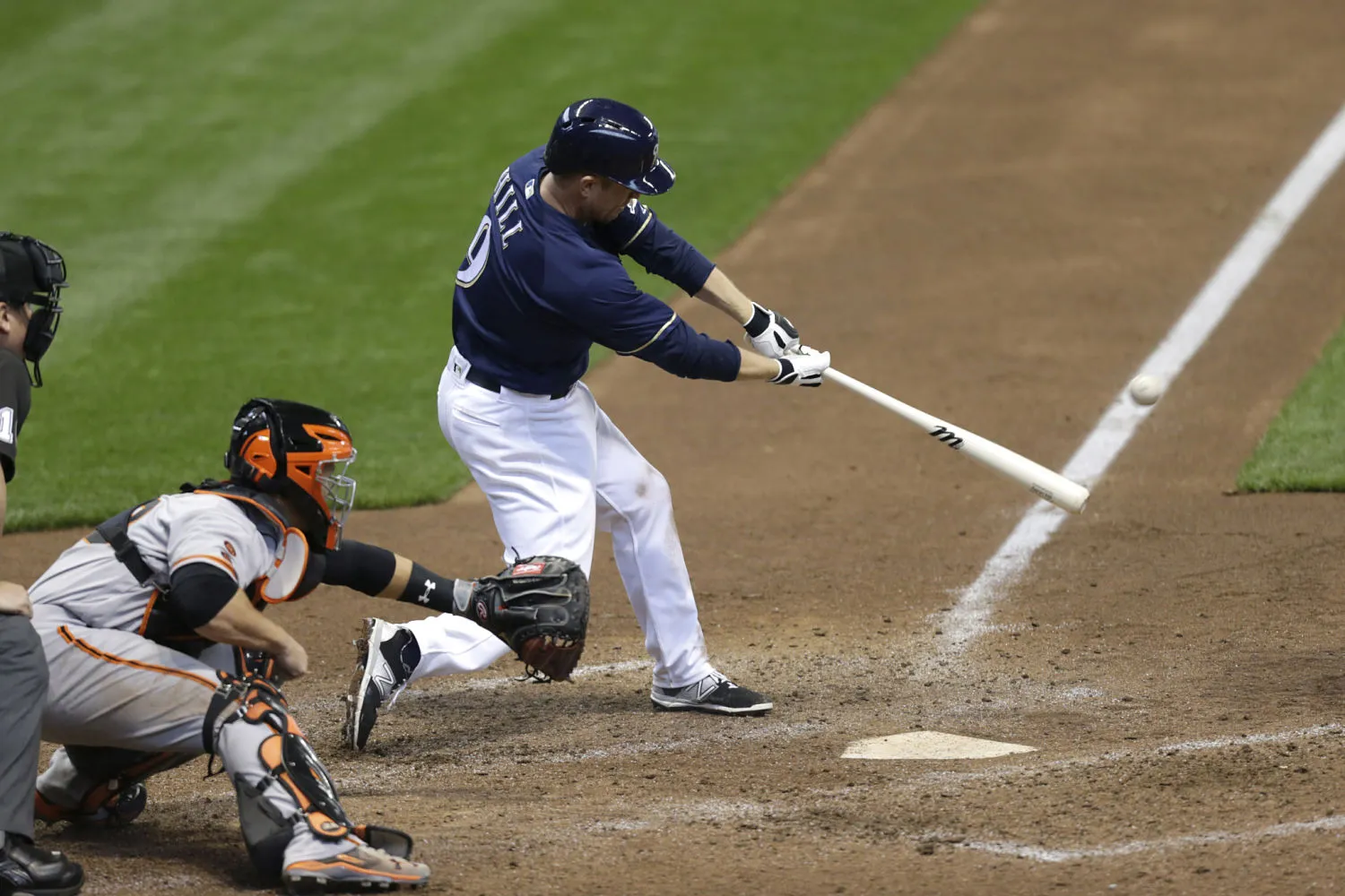 Aaron Hill #9 of the Milwaukee Brewers hits a single in the sixth inning against the San Francisco Giants at Miller Park on April 6, 2016, in Milwaukee.
