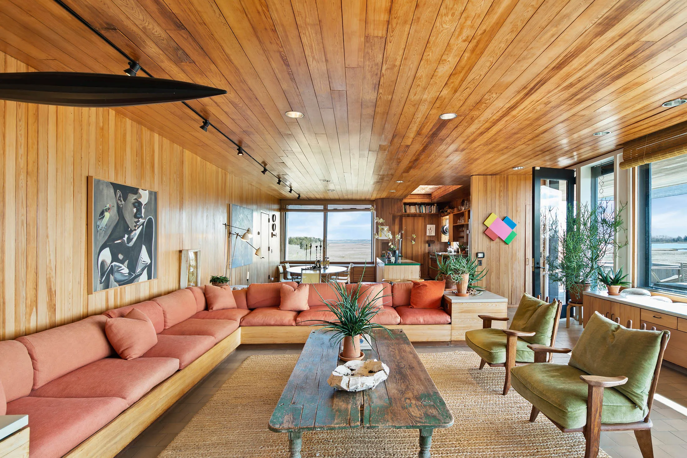 The open-plan living area has a huge built-in couch.