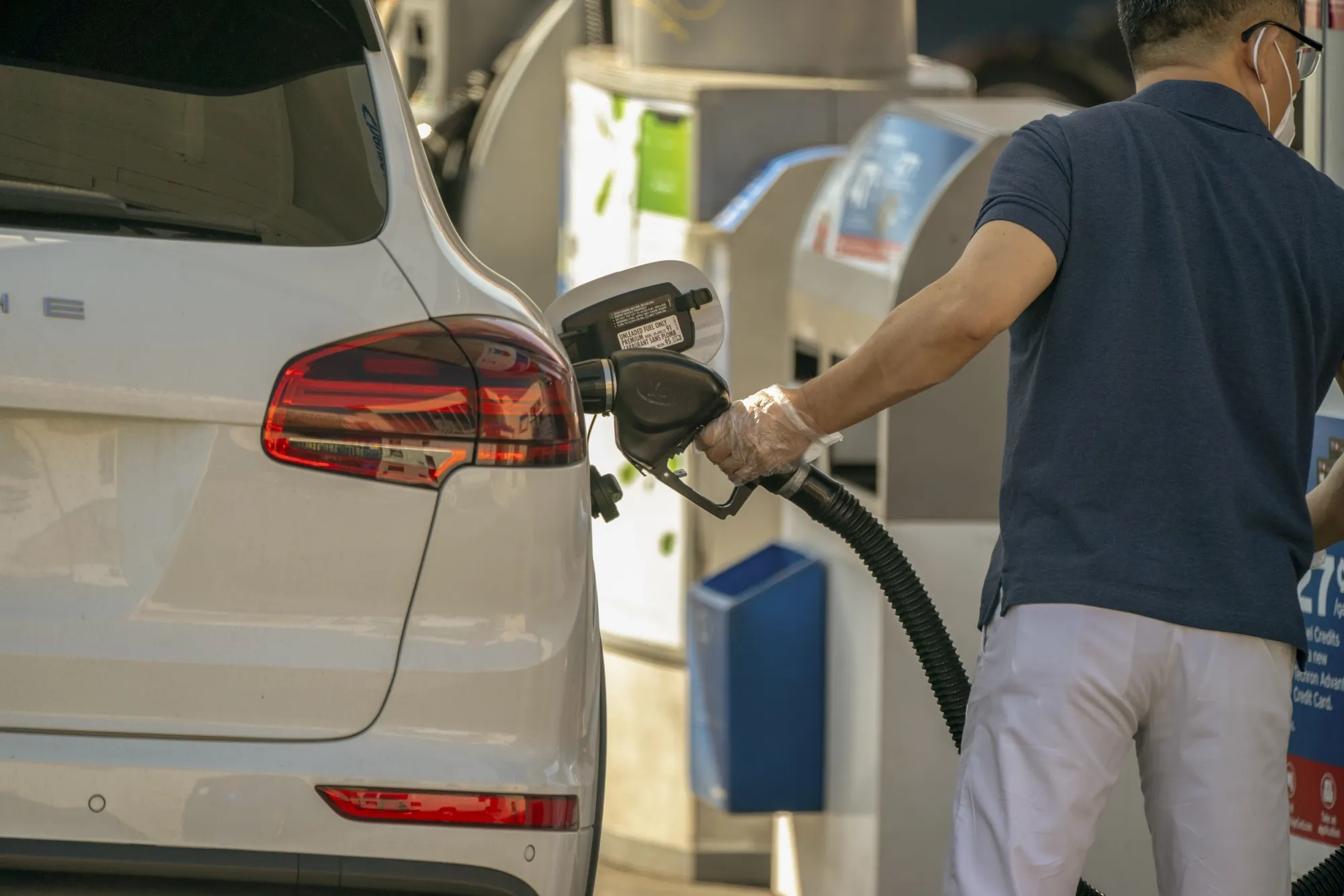 A customer at a Chevron Corp. gas station in Los Angeles.