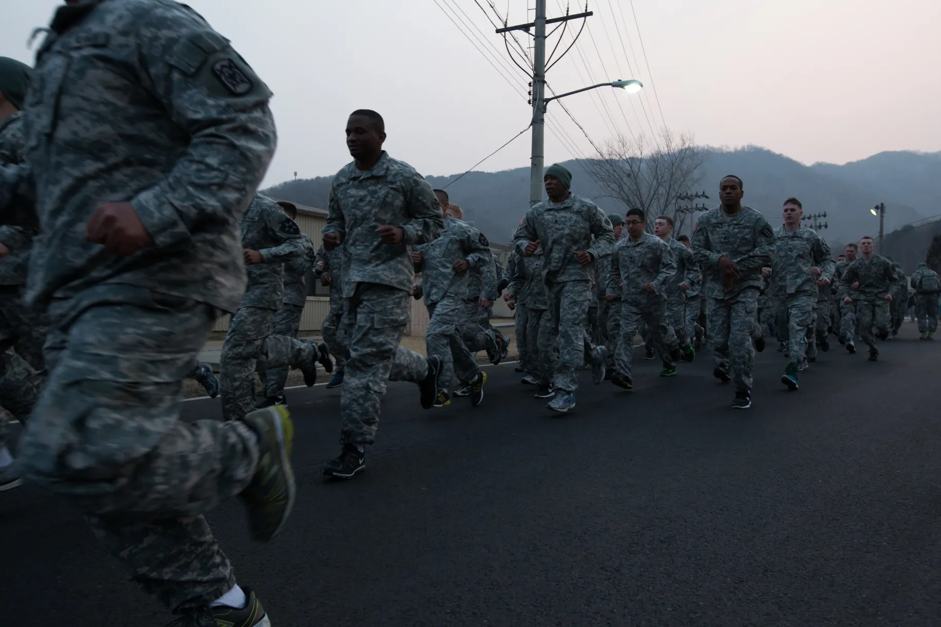 Soldiers with the U.S. Army's Second Infantry Division run during an air assault training course at Camp Casey in Dongducheon, South Korea in 2013.
