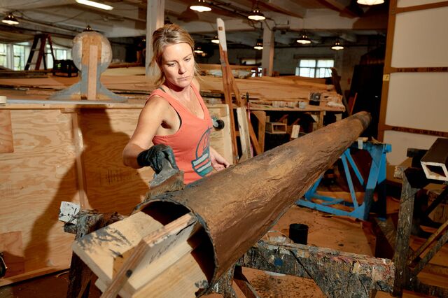 Artist Dana Wilson works on timber for Met Opera's, La Boheme.