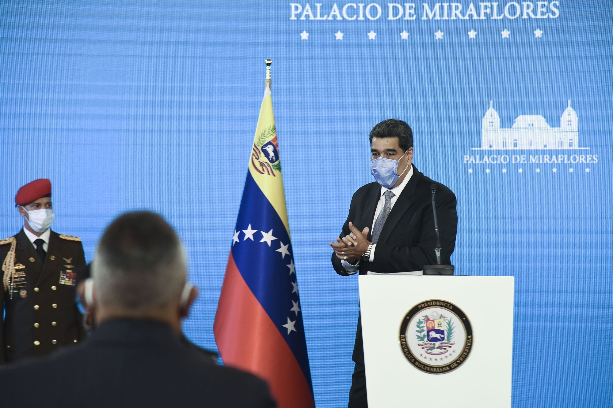 Nicolas Maduro wears a protective mask following a press conference at Miraflores Palace in Caracas on Feb. 17.