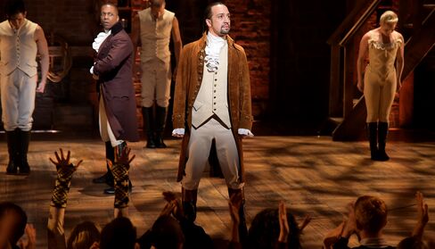 Actors Leslie Odom, Jr., left, and actor, composer Lin-Manuel Miranda, center, performing in Hamilton