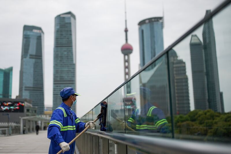 A street cleaner at Lujiazui Finance District in Shanghai.