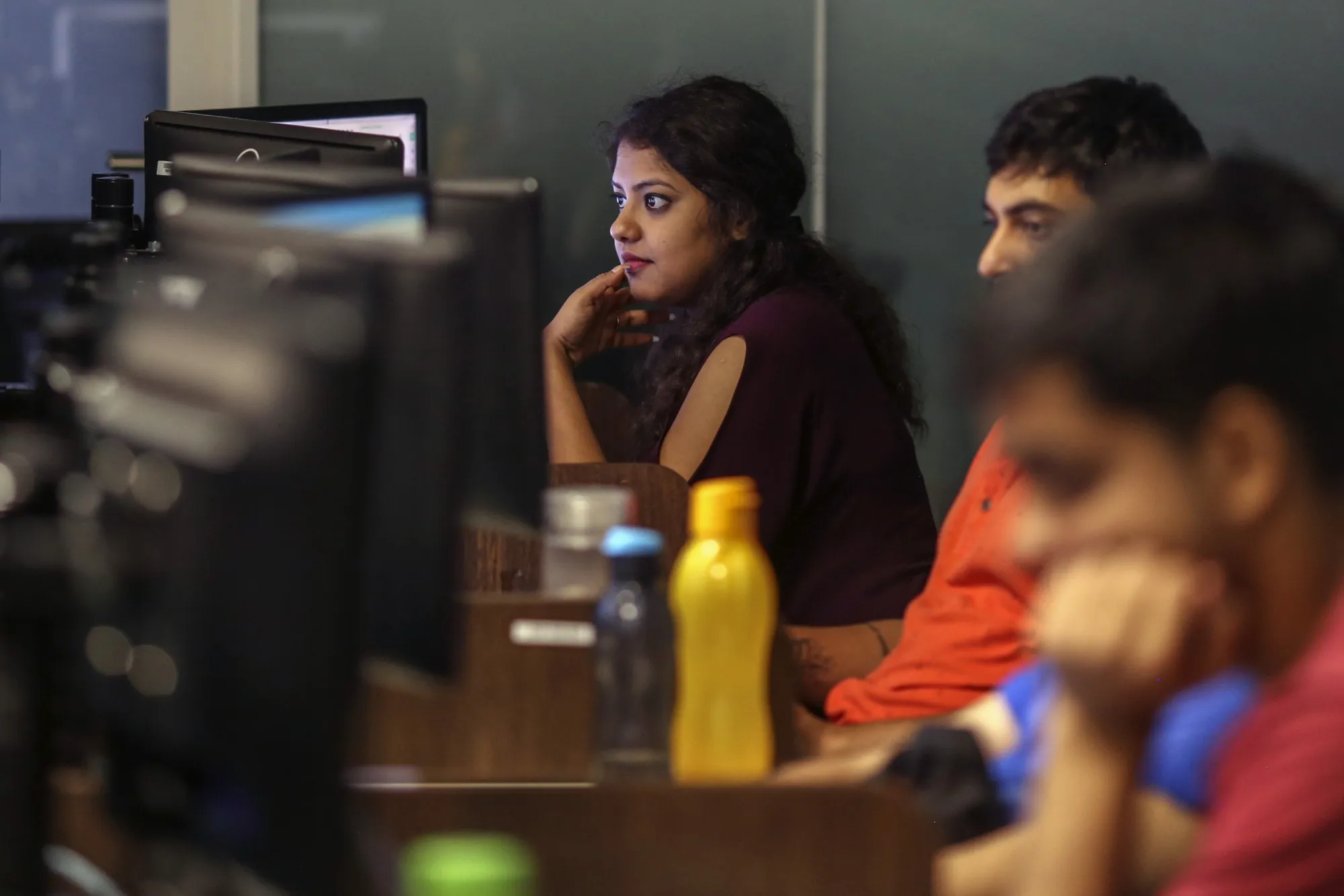 Employees work at an office in Mumbai.
