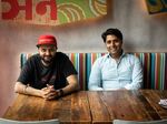 Chef and partner Chintan Pandya and restaurateur Roni Mazumdar in the dining room at Dhamaka at Essex Street Market on the Lower East Side. 