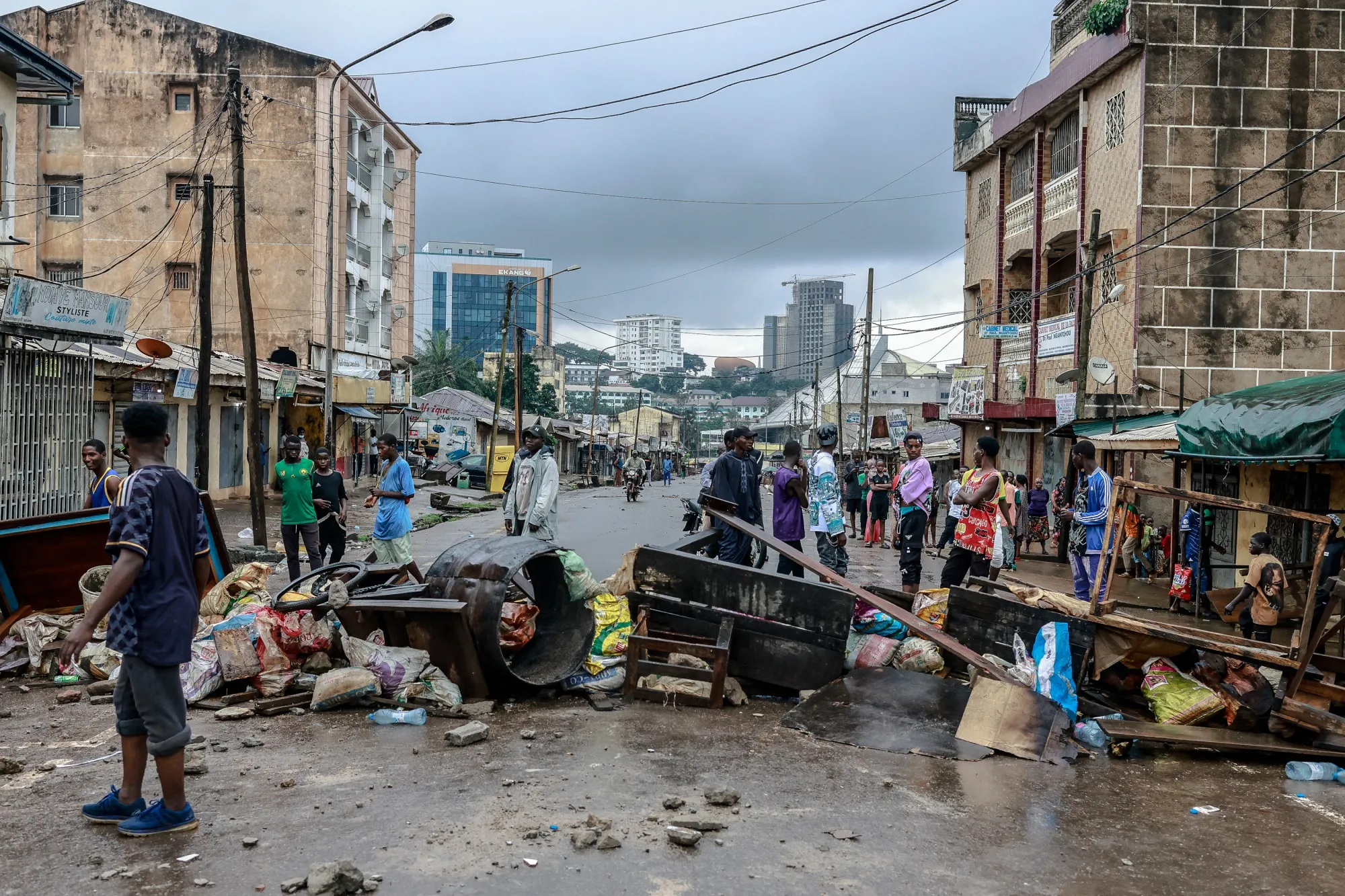 Supporters of opposition leader Issa Tchiroma Bakary build barricades in the street following the announcement of presidential election results, in Yaounde, on Oct. 27.