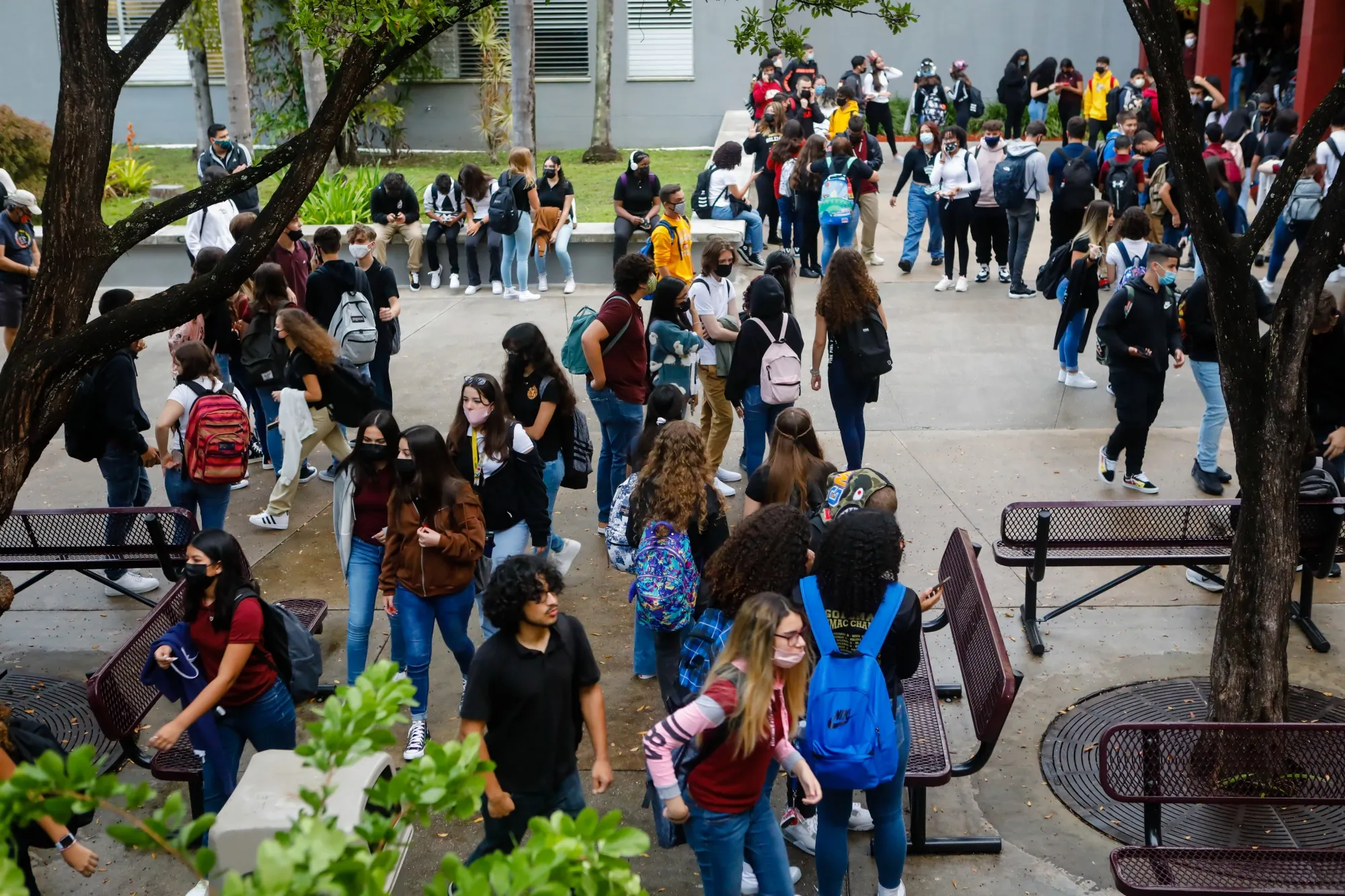 Students arrive for the first day of classes at a public school in Miami in August.