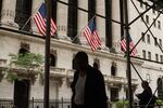 Pedestrians outside the New York Stock Exchange.