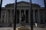 A statue of Albert Gallatin, former U.S. Treasury secretary, stands outside the U.S. Treasury building in Washington, D.C.
