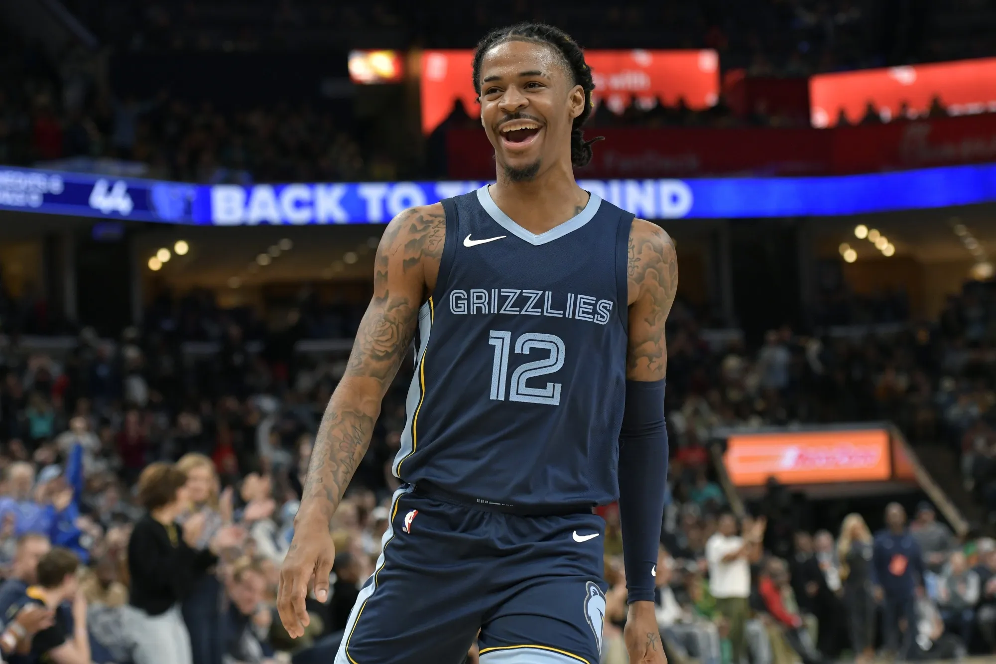 Memphis Grizzlies guard Ja Morant (12) reacts in the first half of an NBA basketball game against the Indiana Pacers, Thursday, Dec. 21, 2023, in Memphis, Tenn. (AP Photo/Brandon Dill)