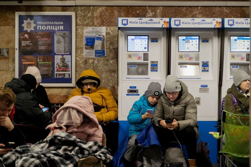 Residents take shelter in a metro station during an air strike alarm in Kyiv, on Nov. 28.