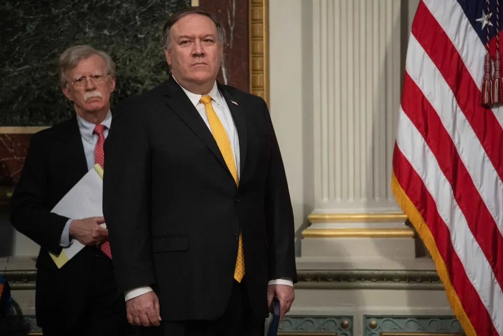 John Bolton and Mike Pompeo, two of the people sending mixed signals on Iran.