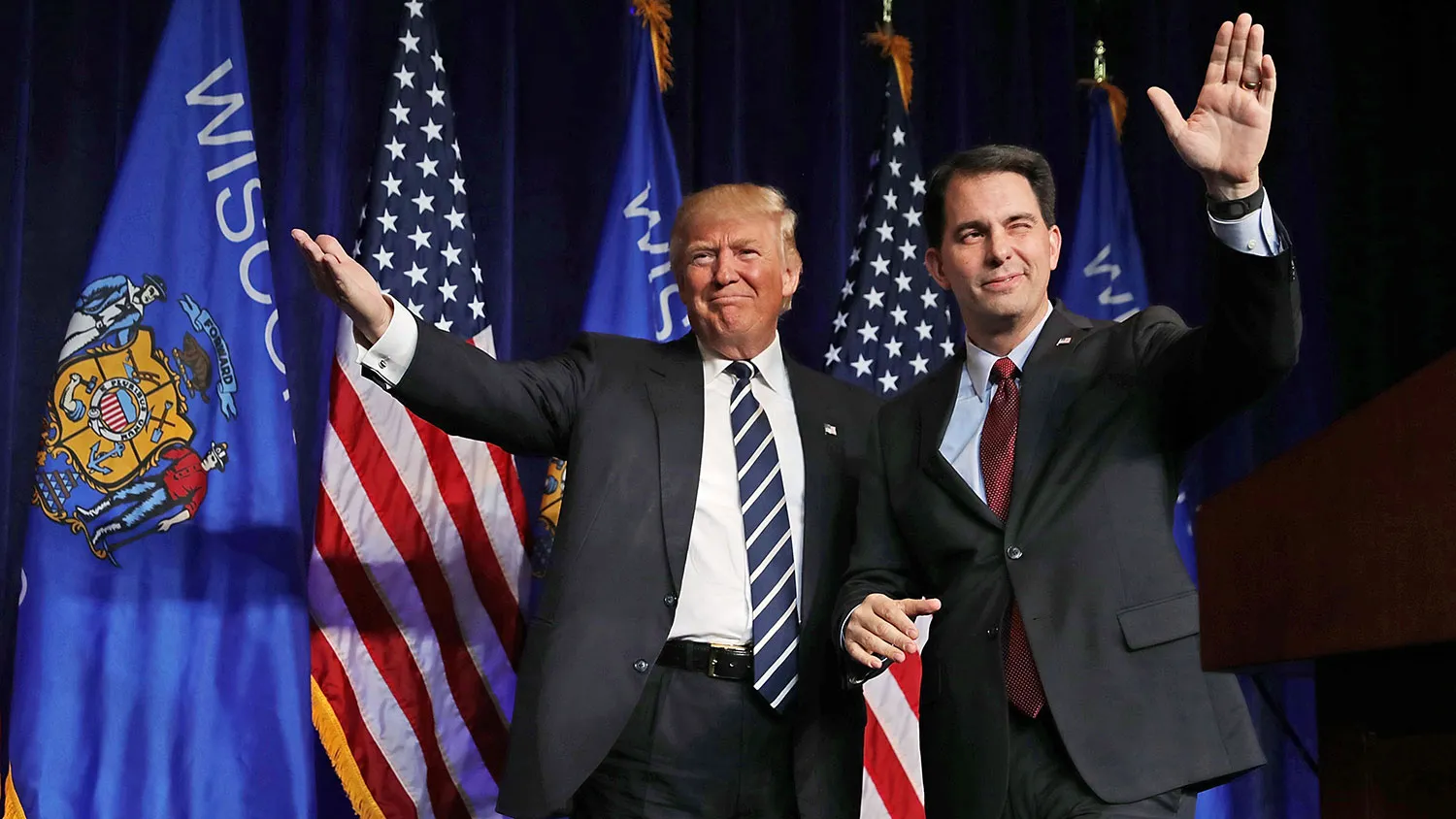 Donald Trump is joined on a Wisconsin stage by Governor Scott Walker on Nov. 1, 2016.

