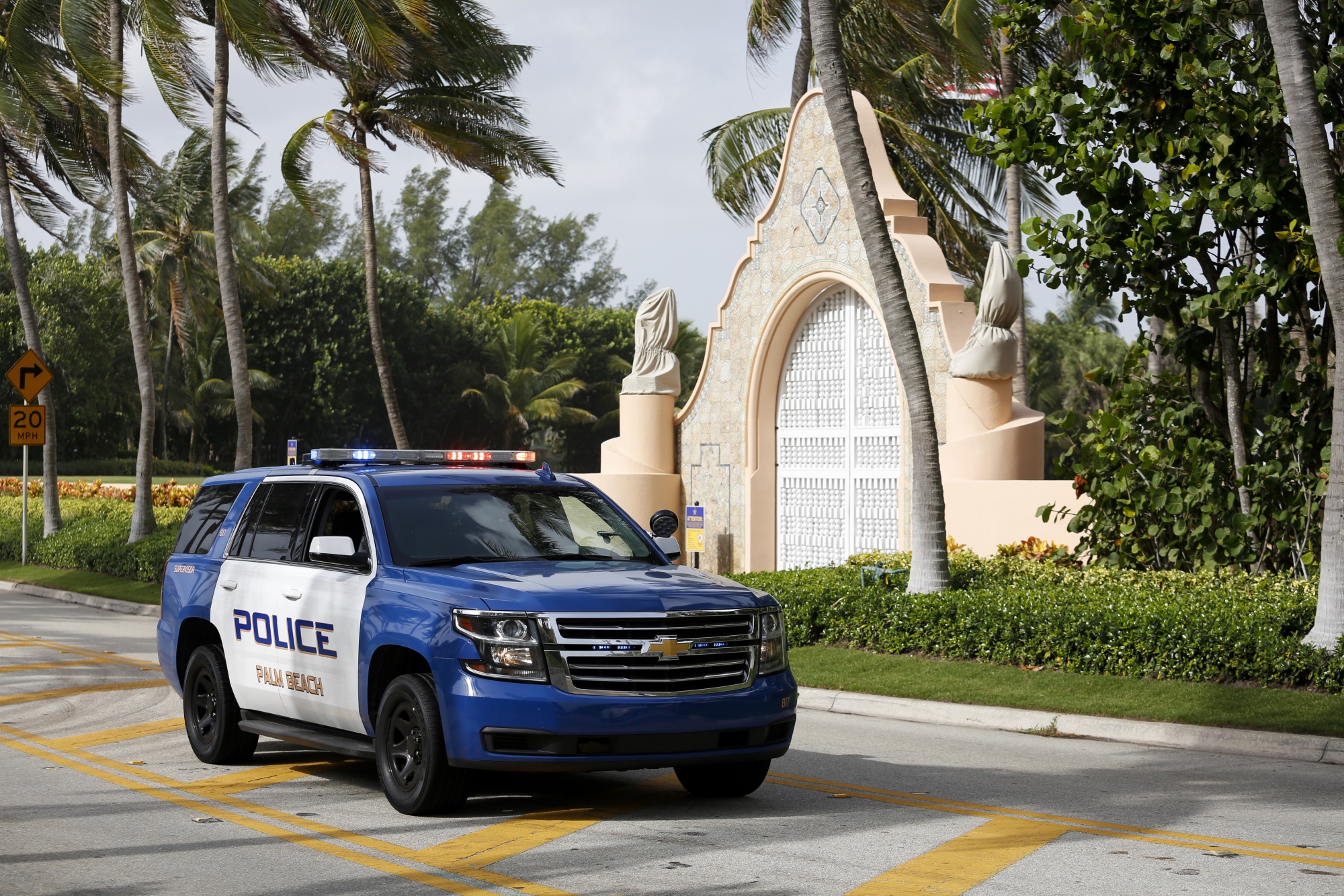 Police at former US President Donald Trump's Mar-A-Lago property in Palm Beach, Florida, on Aug. 9.