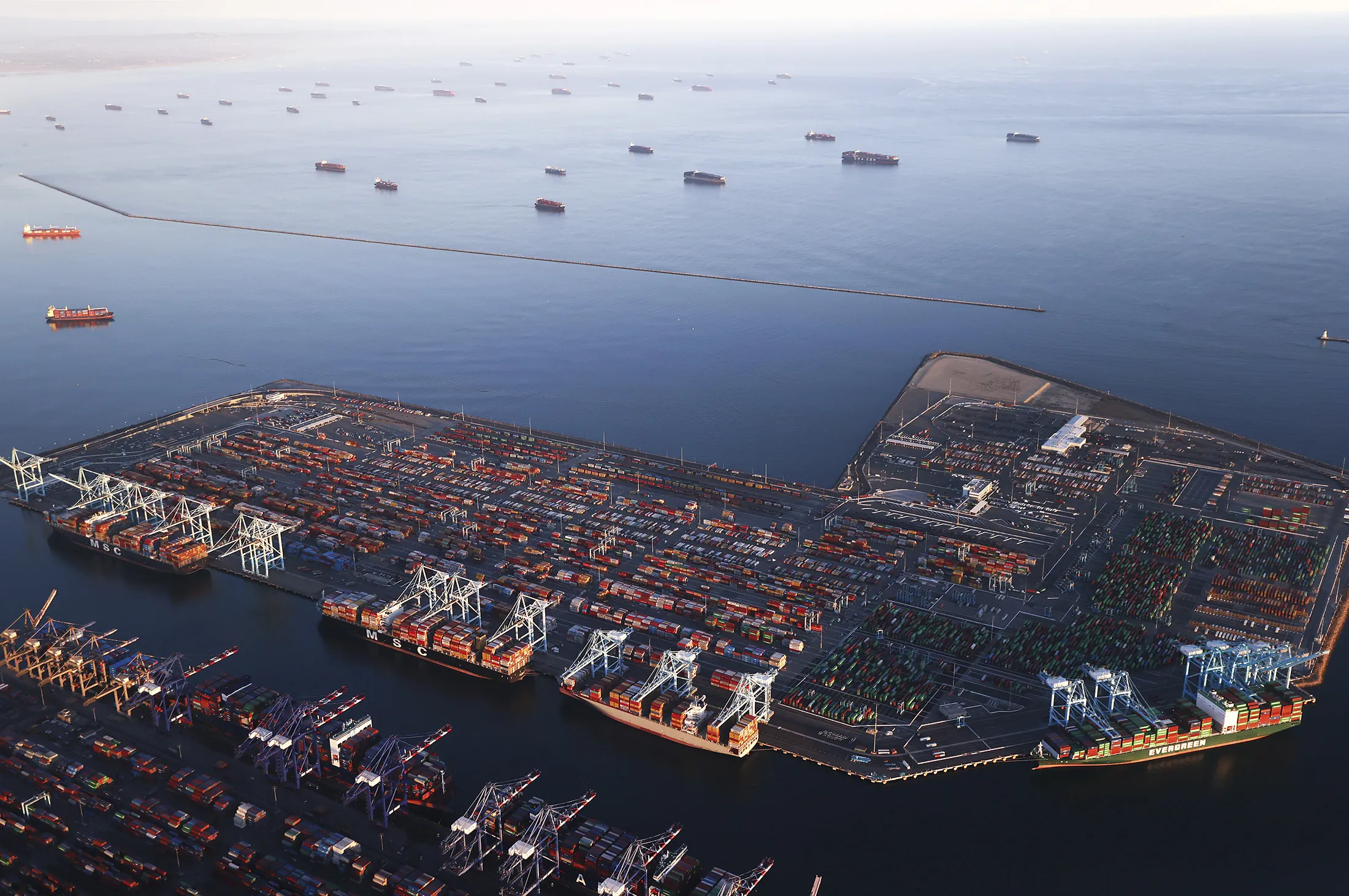 Container ships anchored near the Ports of Los Angeles and Long Beach while waiting to offload on Sept. 20, 2021.