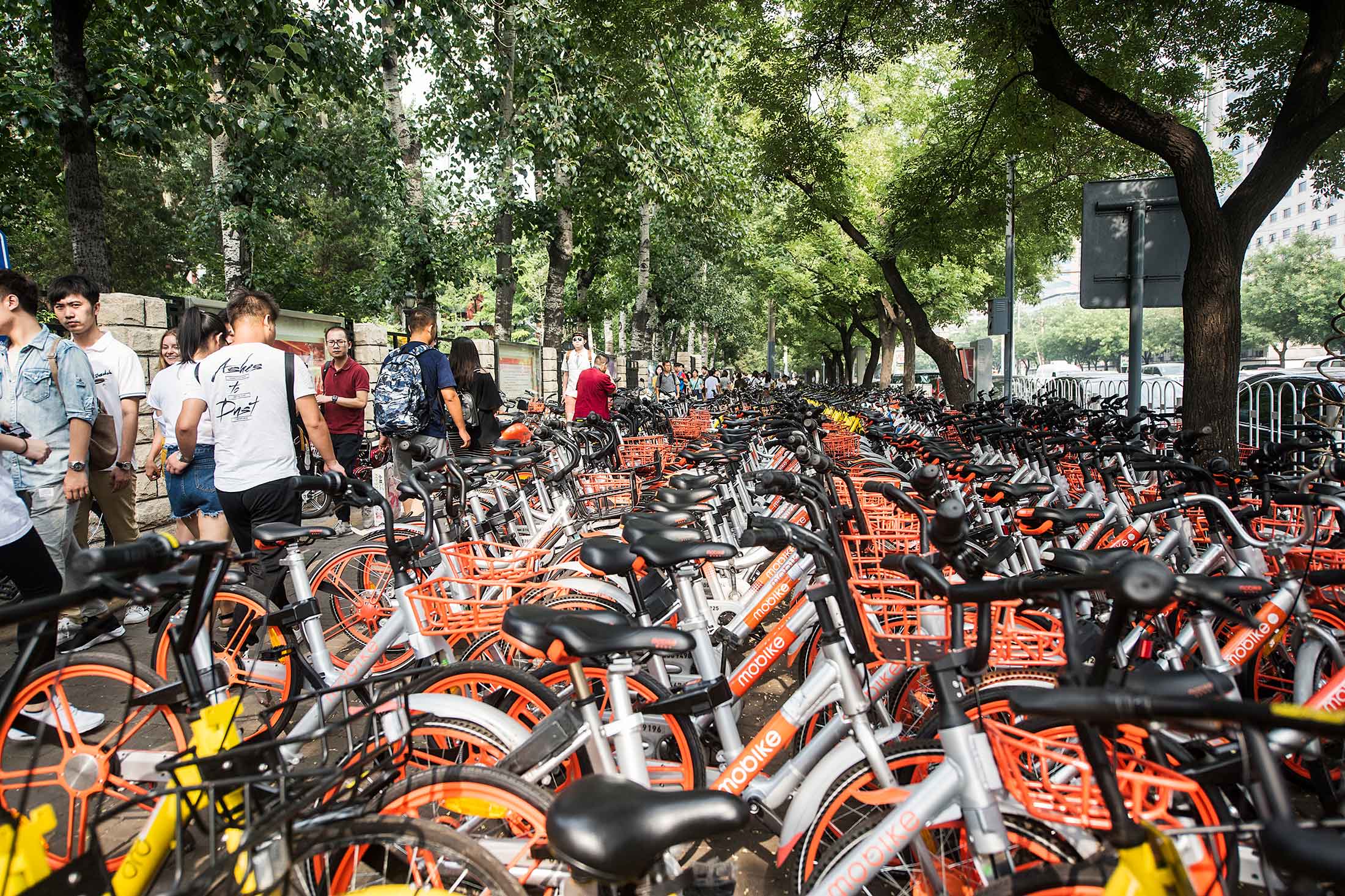 Bike sharing at the subway station near Nanluoguxiang, a street in the old part of Beijing that’s highly popular for small shops and street snacks.