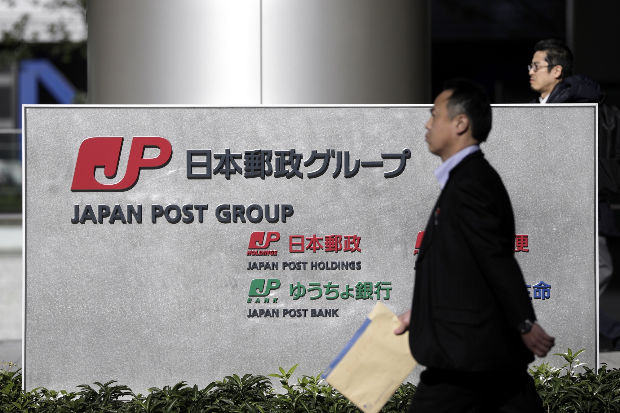 Japan Post's new CEO puts growth aside to fix cluster of scandals