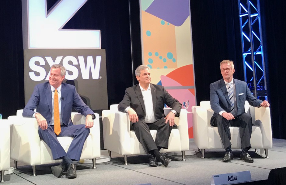Mayors Bill de Blasio, Steven Adler, and Ted Wheeler say net neutrality has become fundamental to the future of democracy.