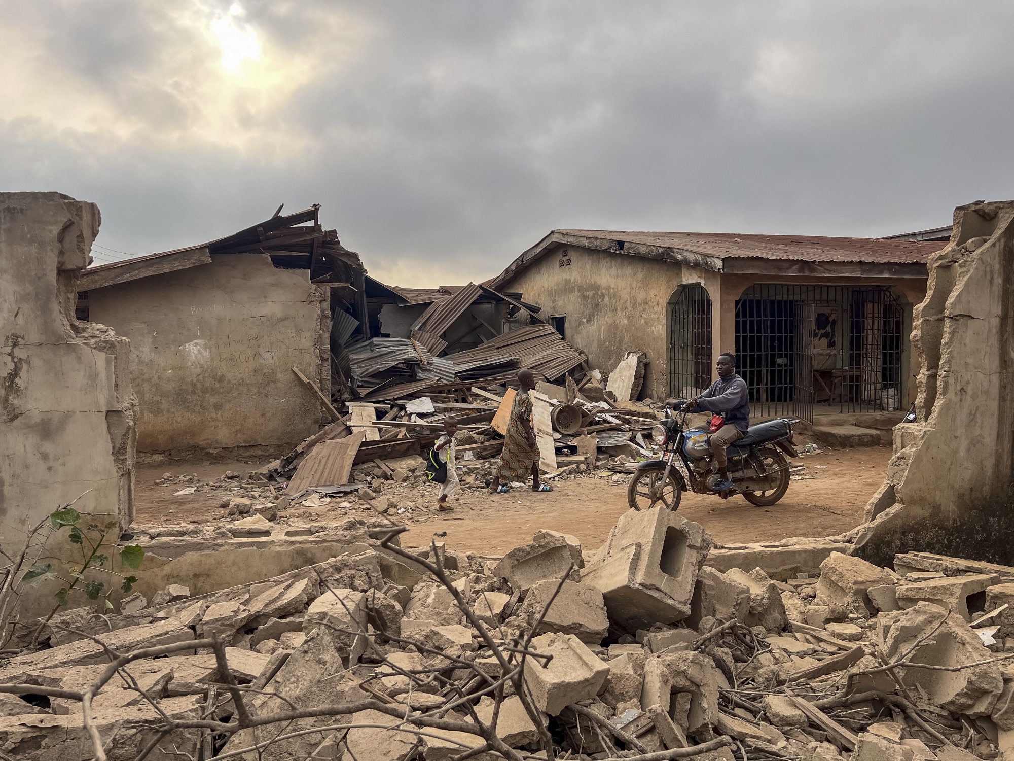 Destroyed structures caused by debris from expended munitions that fell from US strikes on unspecified militants linked to the Islamic State group in Nigeria in Offa on December 27, 2025 . Photographer: Abiodun Jamiu/AFP/Getty Images
