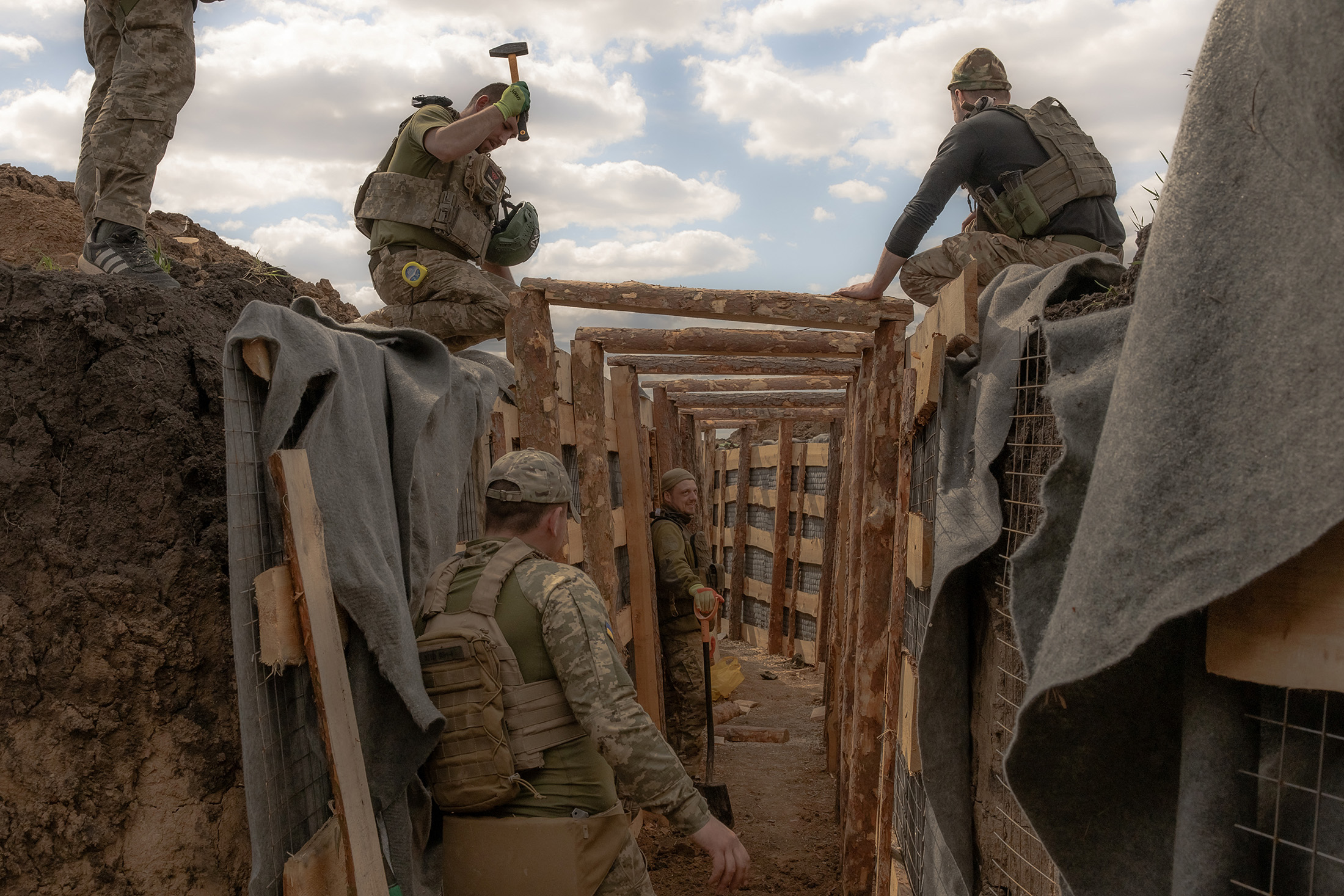 Ukrainian servicemen prepare a trench system in the Donetsk region, on April 4.
