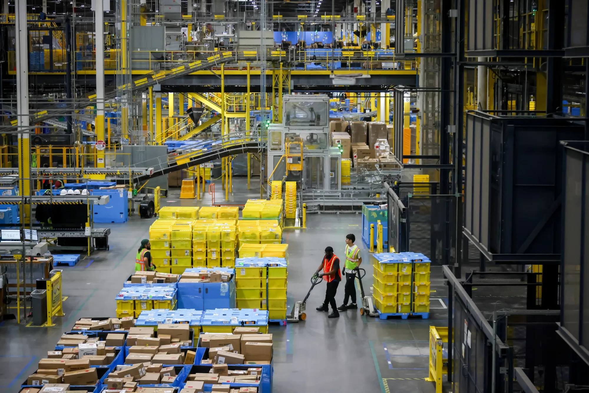 Workers at an Amazon fulfillment center in Robbinsville, New Jersey.