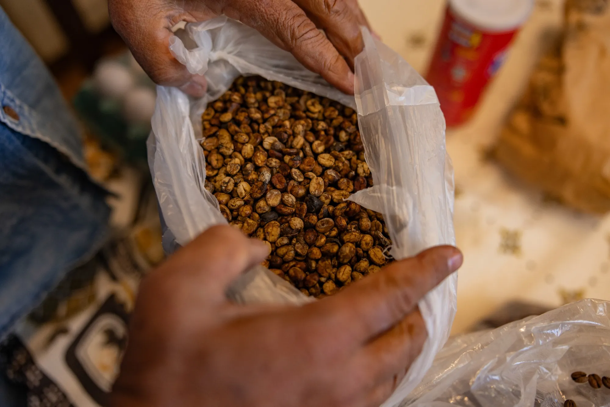 A worker prepares a cup of coffee during a harvest in Jacutinga, Minas Gerais state, Brazil.