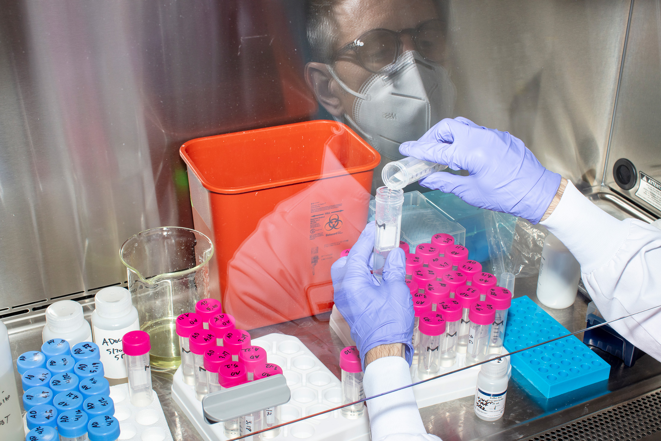 Dr. Eric Alm, Biobot Analytics’ scientific director and a professor of biological engineering at MIT, prepares wastewater samples for RNA extraction and Covid-19 analysis in the company’s lab.