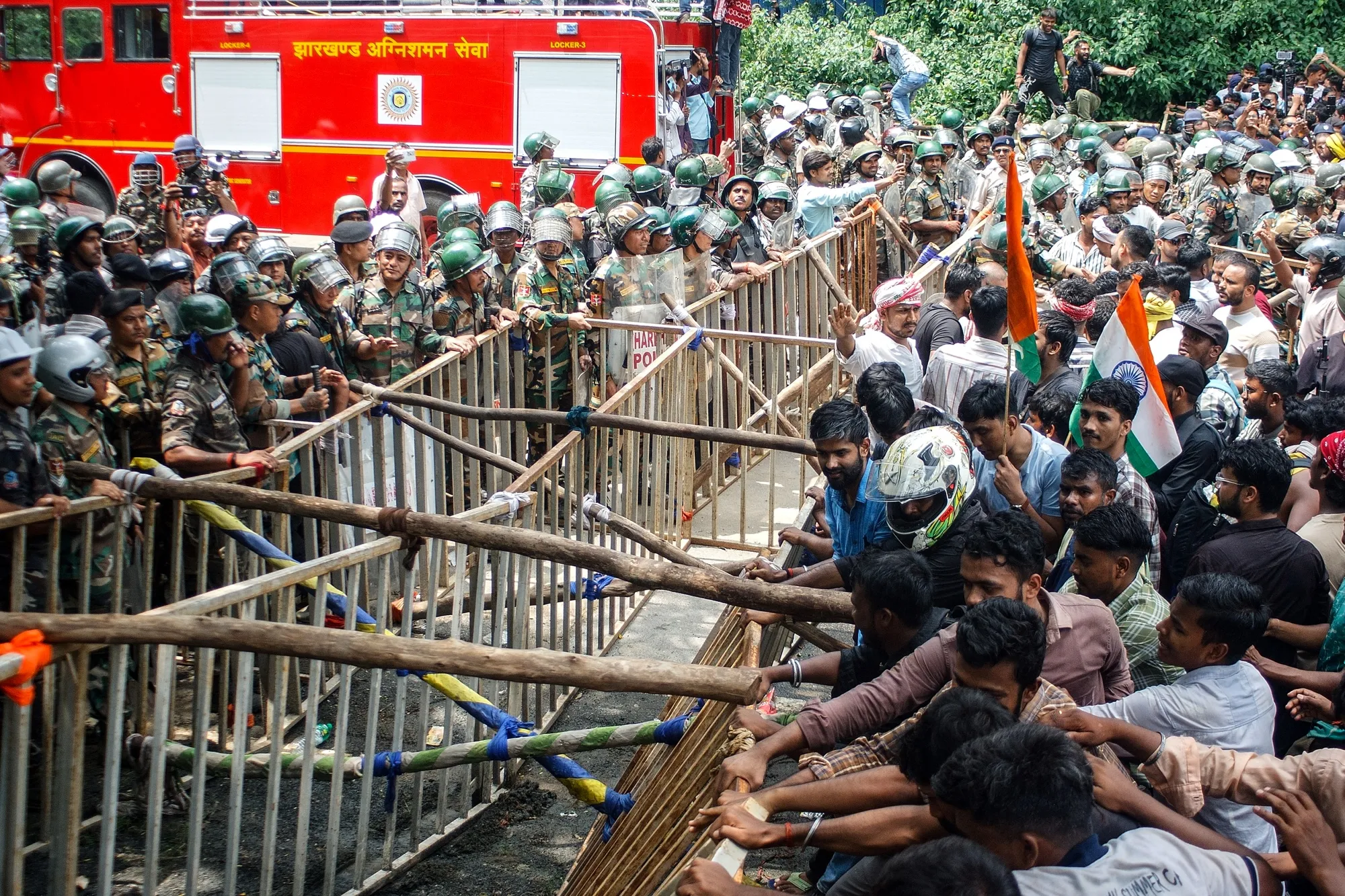 Student protests disrupt India's Parliament, putting Modi on defensive as opposition demands Amit Shah's resignation over police action