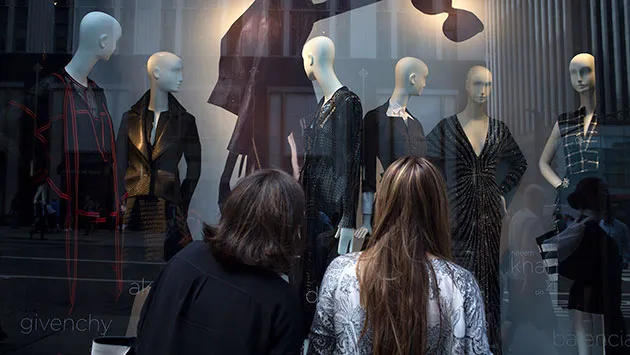 Window shoppers in New York City.
