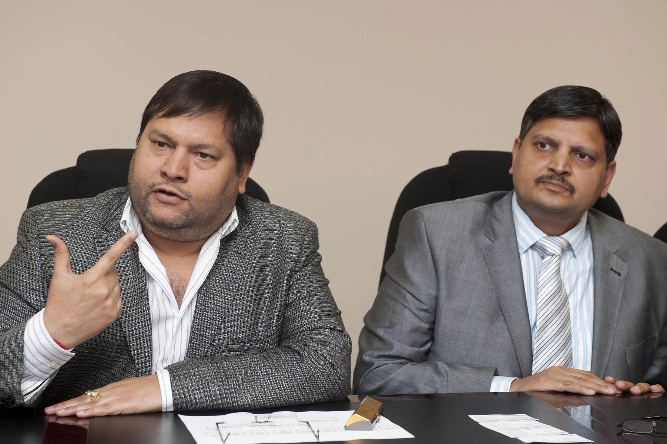 Ajay Gupta, right, and younger brother Atul Gupta.
