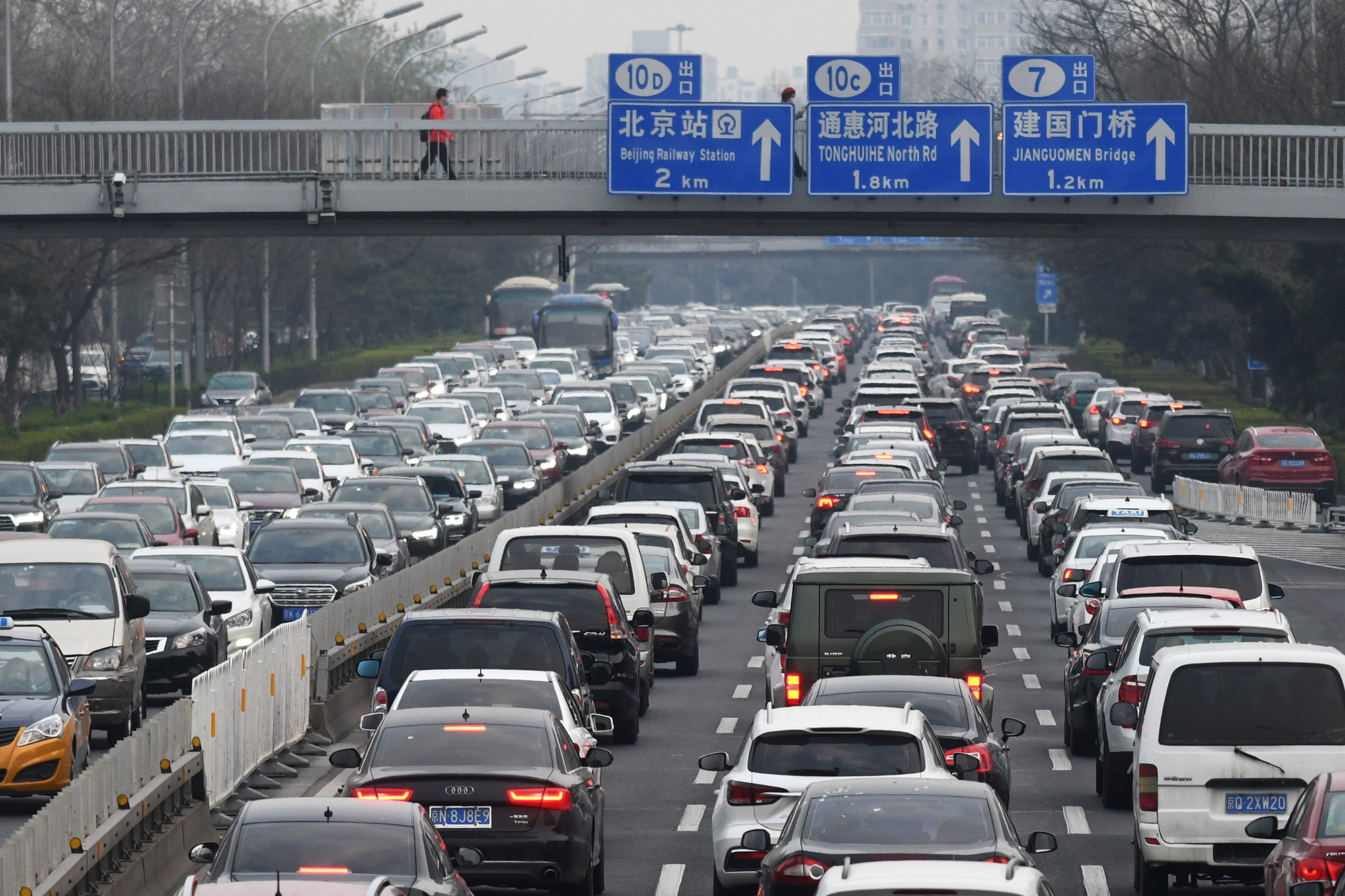 Cars crowd the Second Ring Road in Beijing as traffic gets back to normal.
