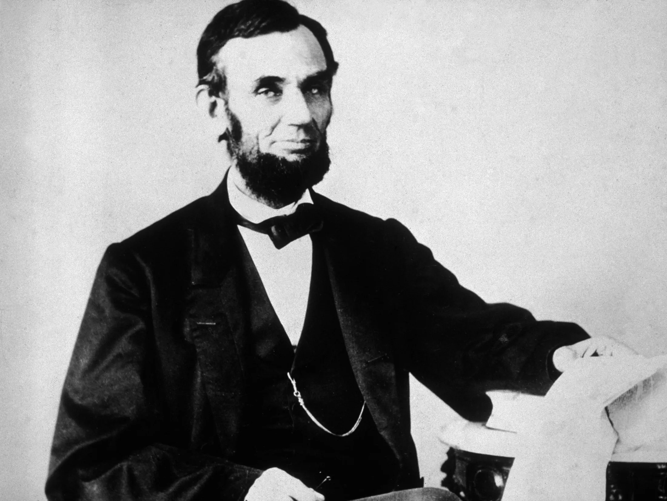 The 16th American president, Abraham Lincoln (1809 - 1865), sitting and leafing through documents, Washington, D.C.   (Photo by Hulton Archive/Getty Images)
