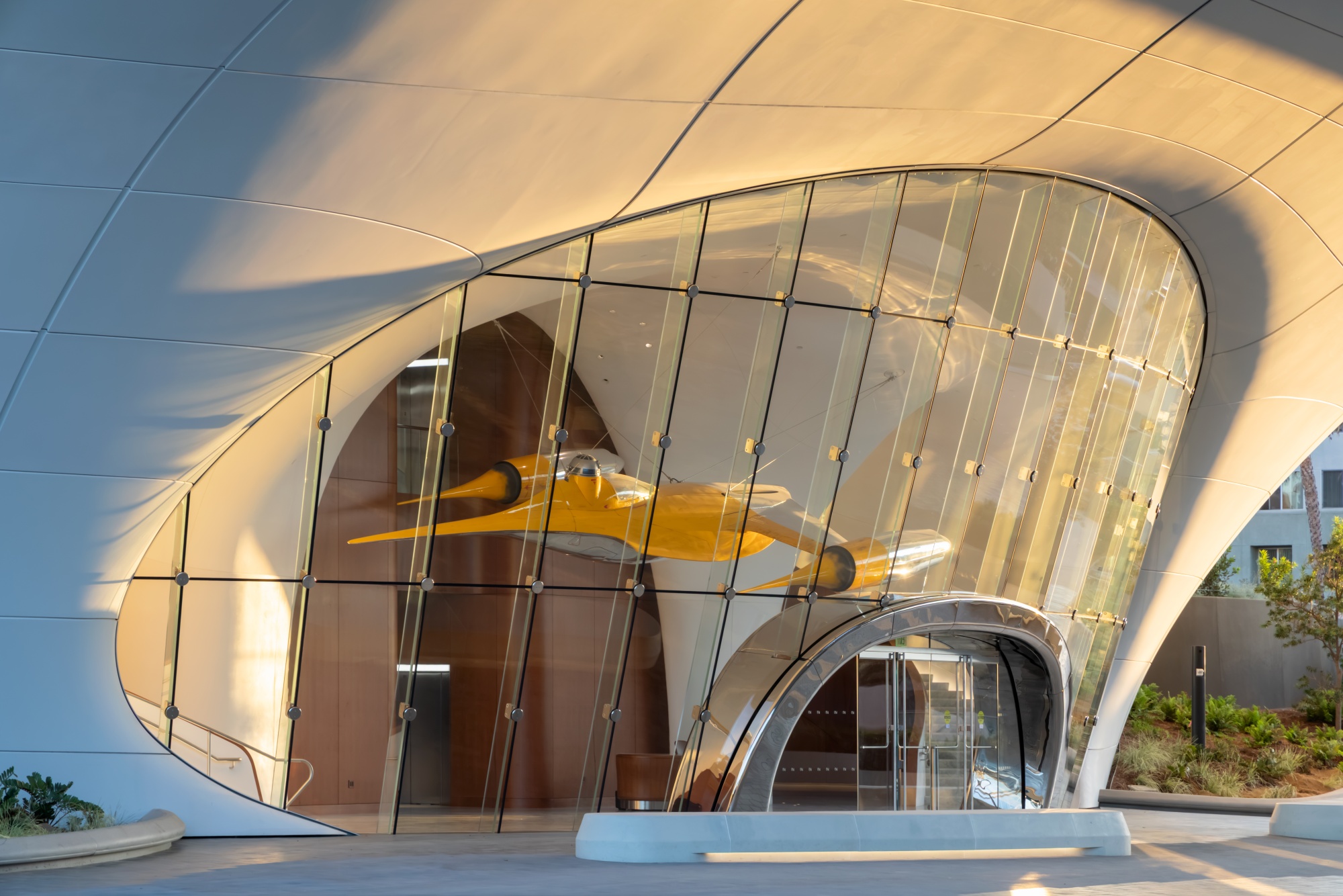 A Naboo Royal N-1 Starfighter depicted in the Star Wars prequels graces an atrium. <em>Photographer: Iwan Baan</em>