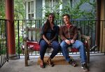 &quot;Map twins&quot; Nanette Tucker and Wade Wilson sit on Wilson's porch on Chicago's North Side.