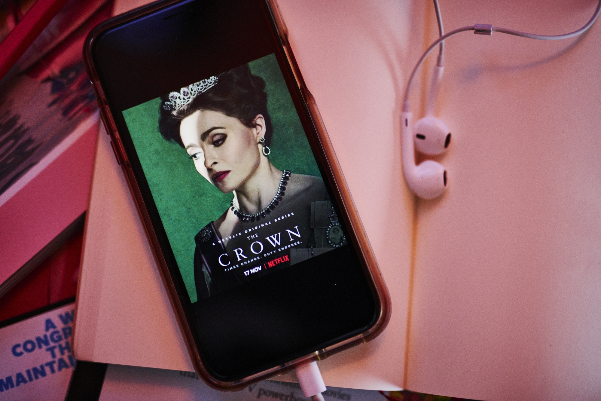 Netflix series &quot;The Crown&quot; is displayed on an iPhone.