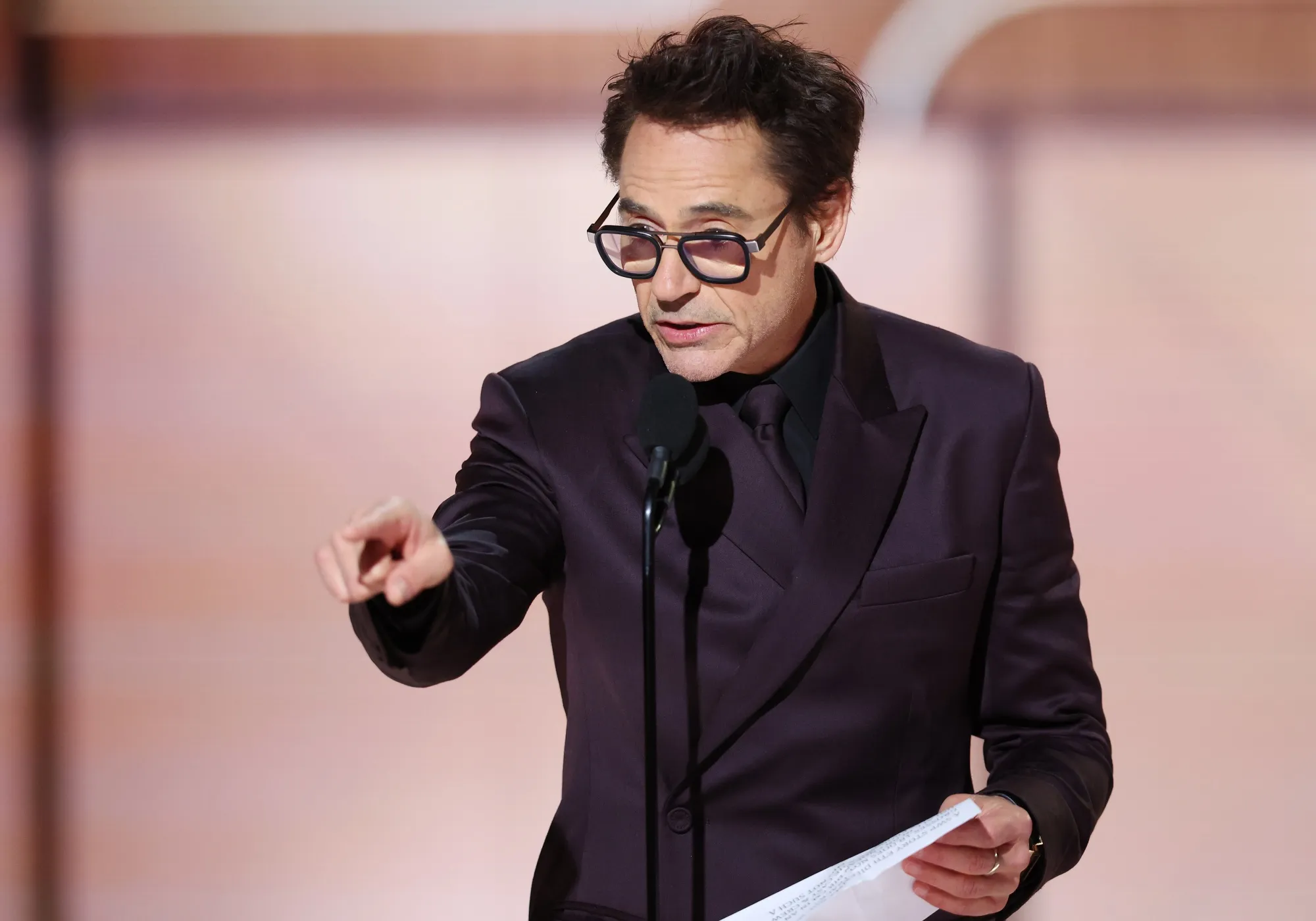 Robert Downey Jr. accepts the award for Best Performance by a Male Actor in a Supporting Role on Jan. 7.