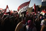 Egyptian opposition protesters celebrate on July 1, 2013 in Cairo's landmark Tahrir square