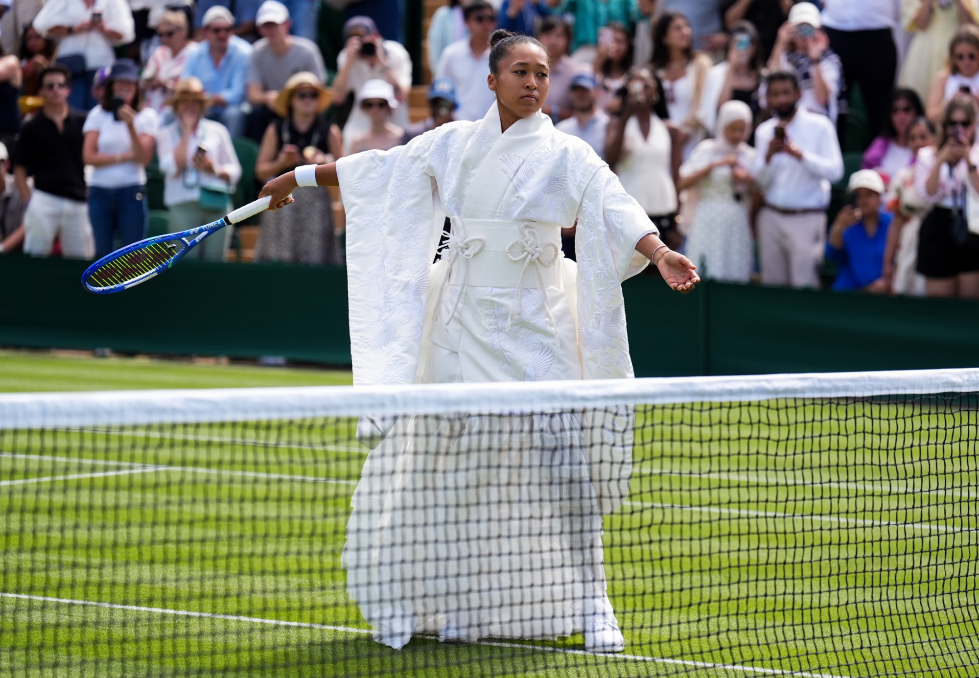 Naomi Osaka of Japan ahead of her match against Elsa Jacquemot of France during the Ladies' Singles on day one of the 2026 Wimbledon Championships at the All England Lawn Tennis and Croquet Club, London. Naomi Osaka made her latest grand slam fashion statement at Wimbledon with a Japanese-inspired outfit. Picture date: Monday June 29, 2026. Photographer: Mike Egerton/PA Images via Getty Images