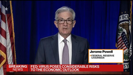 Powell Says No Bond Taper for ‘Some Time’ as Recovery Moderates