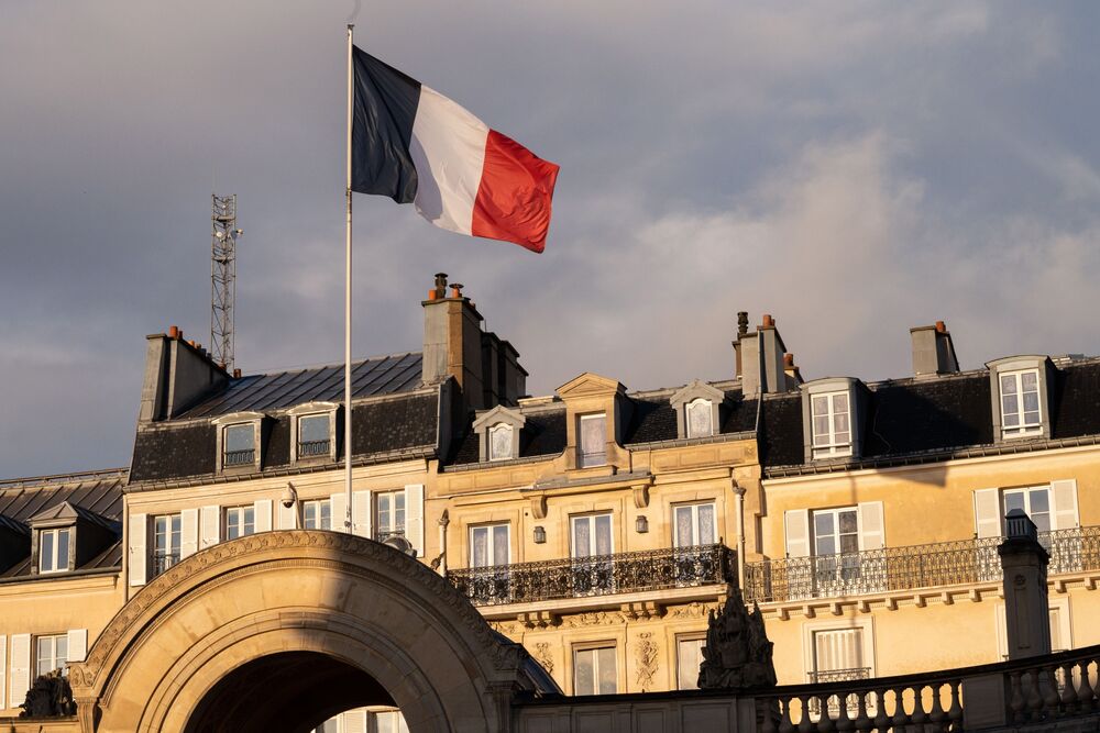 A French national flag at the Elysee Palace in Paris, France. 
