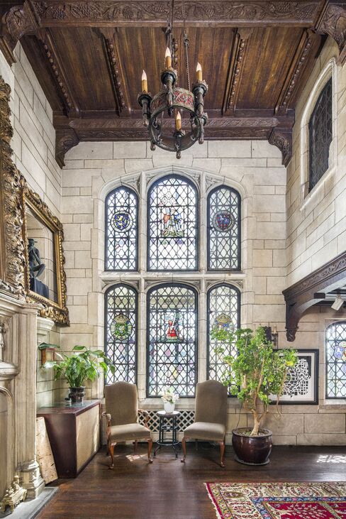 The apartment has a variety of stained-glass windows.