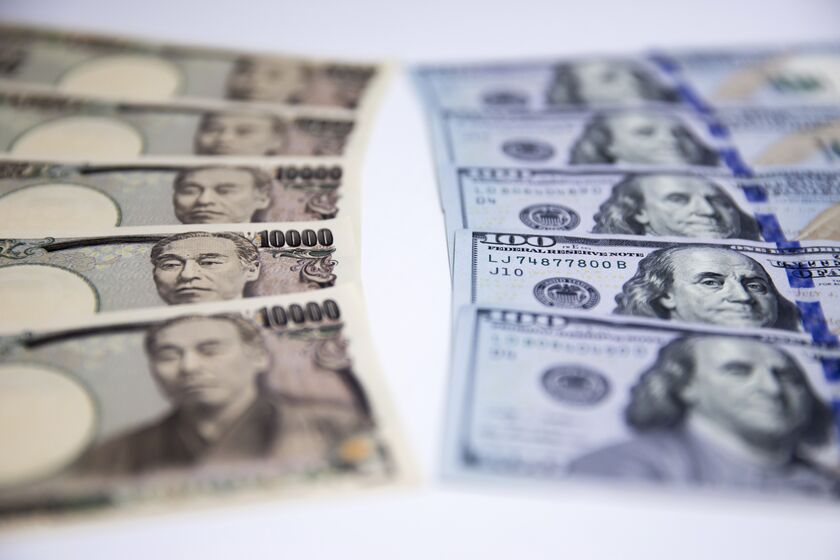 Japanese 10,000 yen and U.S. 100 dollar banknotes 