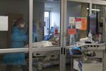Healthcare workers treat a patient on the Covid-19 ICU floor of UMass&nbsp;Memorial Hospital in Worcester, Massachusetts.